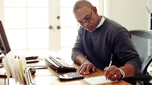 Mature man working in  home office