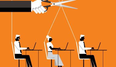 Illustration of three people working on laptops at desks, each controlled by strings like marionettes. A large hand with scissors is poised to cut the string of the middle person. The background is orange, and the style is minimalist.